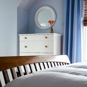 Blue white brown bedroom