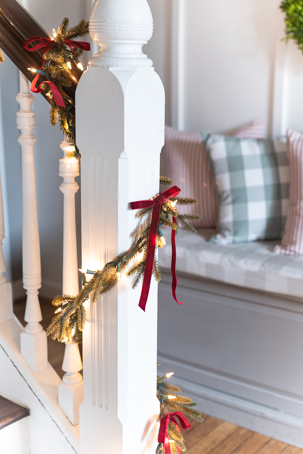 Red, White, Green Christmas Entry Decorating Ideas - Red Velvet Bow on Garland - Decorating Ideas for Entry for Holidays