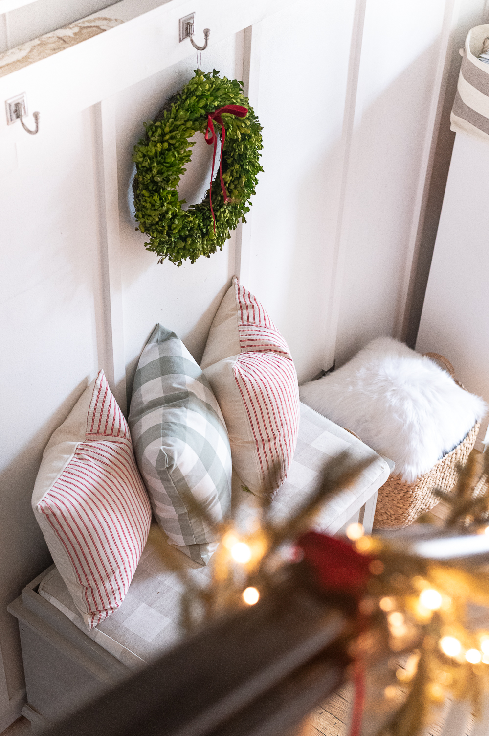 Red, White, Green Christmas Entry Decorating Ideas - Red Velvet Bow on Wreath - Lighted Garland with Red Velvet Bows on Staircase - Decorating Ideas for Entry for Holidays